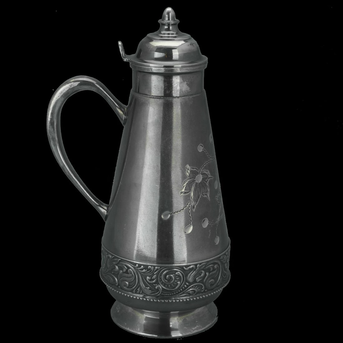 19th C Silverplate Syrup Great Eastern: Title:19th C Silverplate Syrup Great EasternSize:8 1/4 in (21.0 cm) tall x 3 1/2 in (8.9 cm) diameter x 5 in (12.7 cm) wide.Description:A highly ornamental silver plate syrup pitcher with etching and