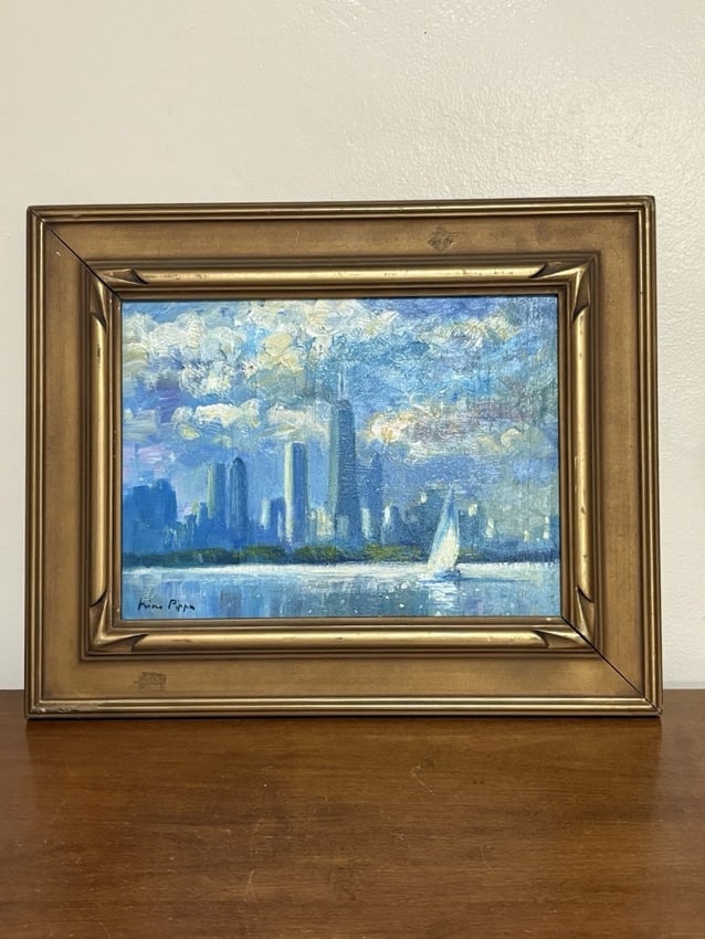 Nino Pippa Oil On Board Painting Of Chicago: DescriptionFor sale is an original oil on board painting of Chicago by nino pippa. The frame measures 16 1/2” x 13 1/2” and the painting measures 11 7/8” x 8 7/8”. It has the o