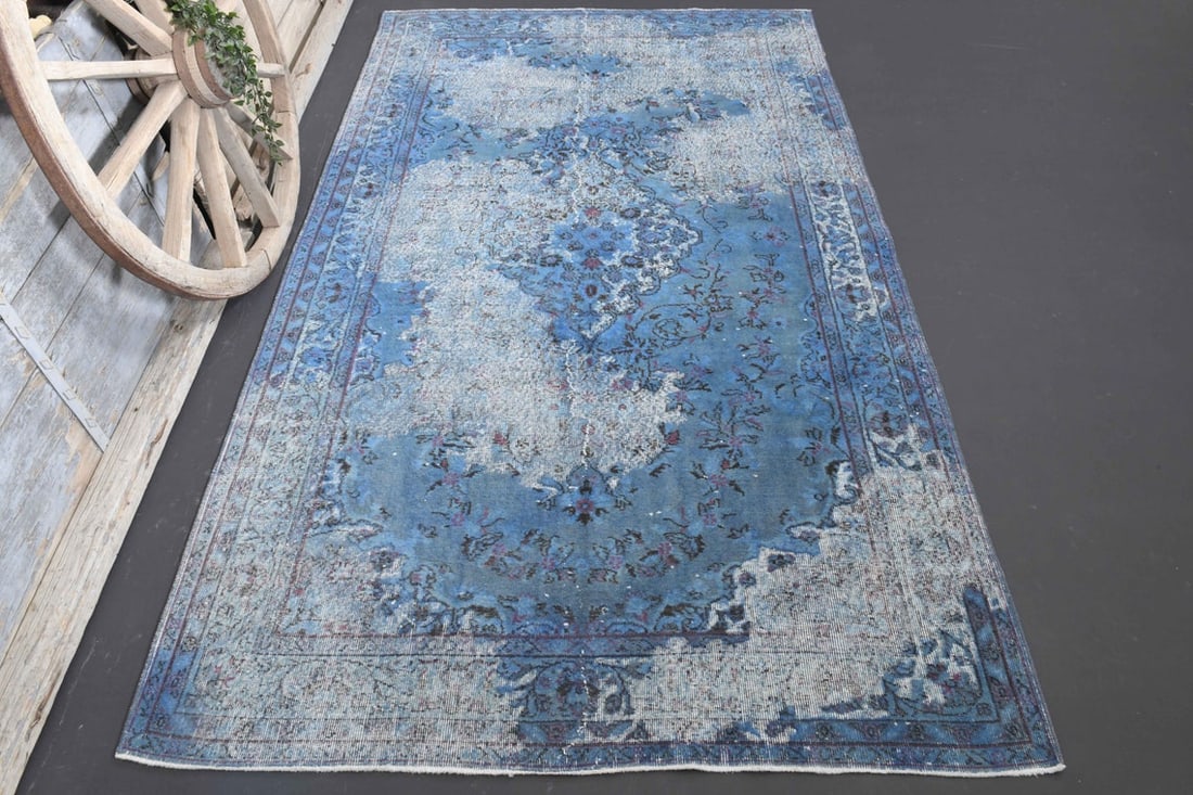 5.9x10 TURKISH Rug, Blue Faded Distressed: Title: 5.9x10 TURKISH Rug, Blue Faded Distressed Origin: Turkey Date/Period: 1960 - 1970 Materials: Wool And Cotton Size: Width: 4.3 feet; Length: 6.7 feet Description: This Turkish one-of-a-kind
