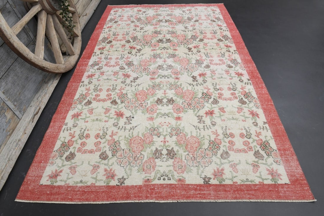 5'6x9'3 FLORAL DECOR, TURKISH: Title: 5'6x9'3 FLORAL DECOR, TURKISH Origin: Turkey Date/Period: 1960 - 1970 Materials: Wool And Cotton Size: Width: 5.6 feet; Length: 9.3 feet Description: This Turkish one-of-a-kind Vintage Turkish
