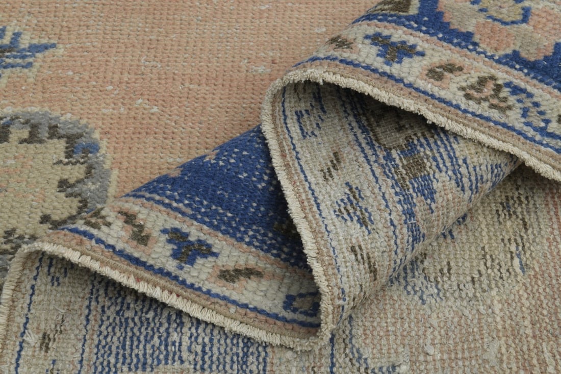 6x9 TURKISH RUG, Faded Pink: Title: 6x9 TURKISH RUG, Faded Pink Origin: Turkey Date/Period: 1960 - 1970 Materials: Wool And Cotton Size: Width: 5.6 feet; Length: 8.6 feet Description: This Turkish one-of-a-kind Vintage Turkish Ru