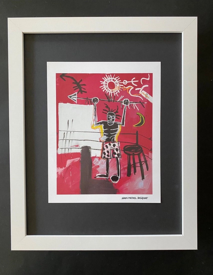 JEAN MICHEL BASQUIAT | SIGNED PRINT | MOUNTED IN NEW FRAME: JEAN MICHEL BASQUIAT 1980'S VINTAGE PRINT FACSIMILE SIGNED IN INK JEAN MICHEL BASQUIAT HIGH QUALITY PLATE MEASURE IS ABOUT 10X8 IN VERY GOOD CONDITION WITH EXPECTED HANDLING, CREASING AND TONING FOR
