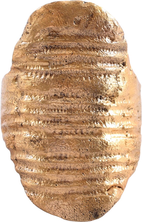 SUPERB VIKING SHIELD RING C. 9TH-10TH CENTURY, SIZE 9 ¼: Ring size 9 ¼. The oval bezel is just about 1 1/4" (1.23") in length. Broad overlapping prong band allowing for some adjustment. The large oval bezel with three sets of raised transverse ridges f