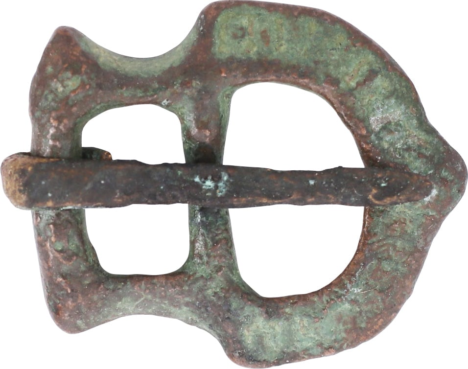 FINE ROMAN LEGIONARIES BELT BUCKLE, 3rd-4th CENTURY AD: Specifically identifiable form. Bronze. 1 1/8" length. Elegant form with a box frame and reeded crescent from the terminal. Original tongue. For the sword and dagger belt of the Roman legionary.