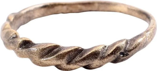 ANCIENT VIKING ROPED OR TWIST WEDDING RING, SIZE 9 1/2: Cambridgeshire, England, 866-1067 AD. A little over size 9 1/2. 1.6mm at the bottom swelling to 3.4mm at the top. The top half is a deeply modeled roped motif. The spiral or helix was a favorite Vikin