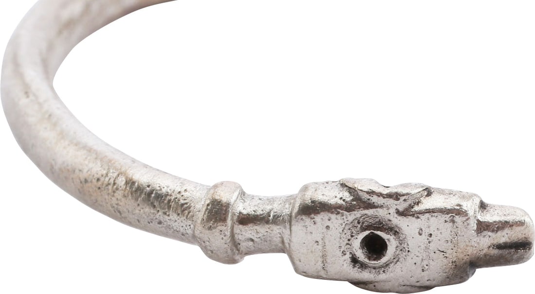 VIKING SERPENT BRACELET 800-900 AD: Silvered bronze, 2 3/8" inside dimension with well modeled serpent (snake) head with tail opposite. The head is particularly well modeled with rows of dots representing the scales and a collar behind.
