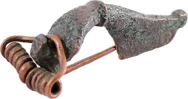 ROMAN/BYZANTINE FIBULA, C.4th-6th CENTURY.: The original garment pin patented two millennia later as the "safety pin." Bronze, just under 1 3/4" length, of delicate form probably for a delicate woman's garment. This example distinguished by bei