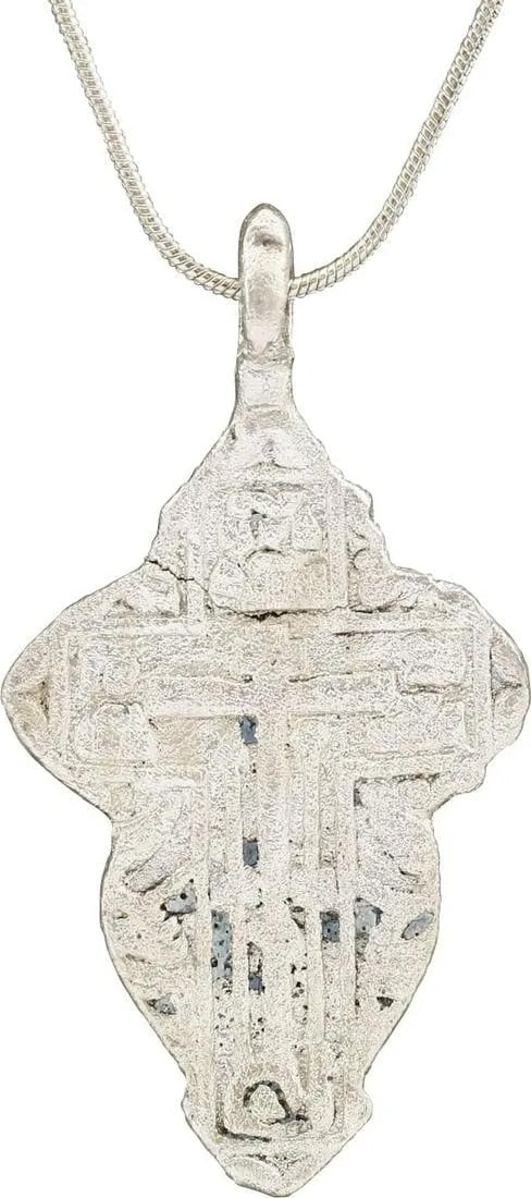 LARGE EASTERN EUROPEAN CHRISTIAN CROSS NECKLACE: 17th-18th century, Orthodox rite. Silvered bronze, over 2" height. A raised edge cross enclosing a stick cross (no Corpus Christi) with ciphers at the beam terminals. Surrounded by Baroque