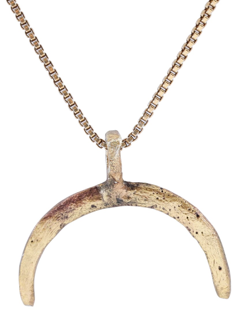 VIKING LUNAR PENDANT C.900-1000 AD: Over ¾” (0.83”) width. As expert navigators, the constellations signified mystery and power to Vikings. The Moon was personified as Mani, brother to Sol the Sun, and is abundantly rep