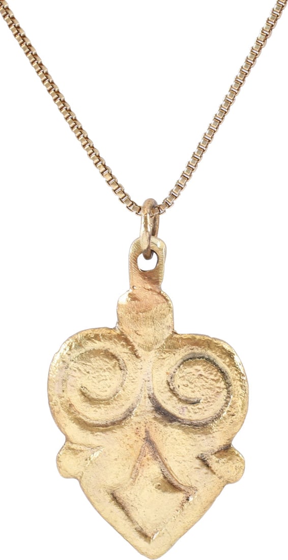 ANCIENT VIKING HEART PENDANT NECKLACE, C.850-1050 AD: Over 3/4” (0.80”) in height plus the loop. Flat with rounded edges. The heart in its fully evolved with cusped top and broad borders forming the cusp and top of the central trefoil, a