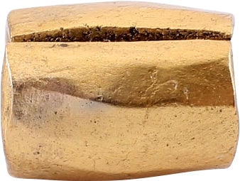 ANCIENT VIKING GILT BEAD, 9TH-11TH CENTURY AD: 8.3mm in length, about 1/3 inch. Hand formed from bronze, forged to hexagonal section with the center swelled to a ridge. Butted seam. Professionally refurbished with the 24karat gold overlay