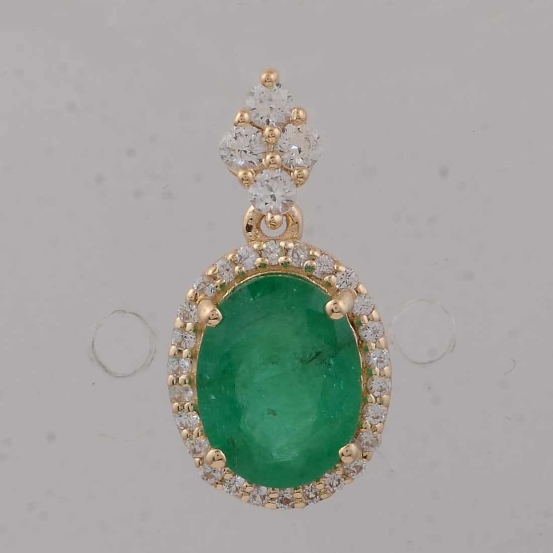 1.65 Ct Oval Emerald 9K Gold Pendant: Title: 1.65 Ct Oval Emerald 9K Gold Pendant Description: 1.65 Total Carat Emerald 9K Gold Pendant Specifications - Total Weight 0.97 g - Center Gemstone Emerald - Gemstone Carat Weight 1.37 Carats -