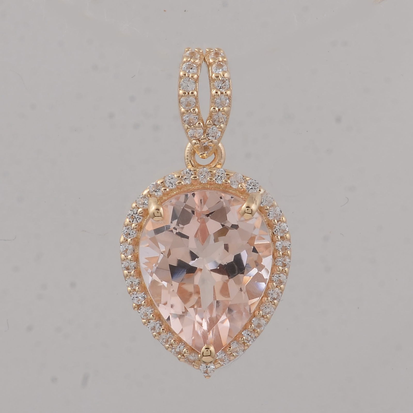 2.57 Ct Pear Morganite 9K Gold Pendant: Title: 2.57 Ct Pear Morganite 9K Gold Pendant Description: 2.57 Total Carat Morganite 9K Gold Pendant Specifications - Total Weight 1.49 g - Center Gemstone Morganite - Gemstone Carat Weight 2.37