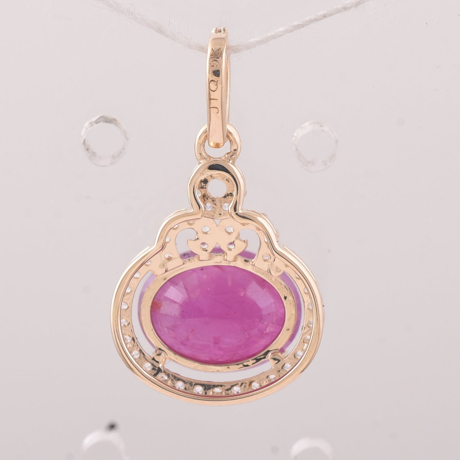 2.81 Ct Oval Ruby 9K Gold Pendant - 2