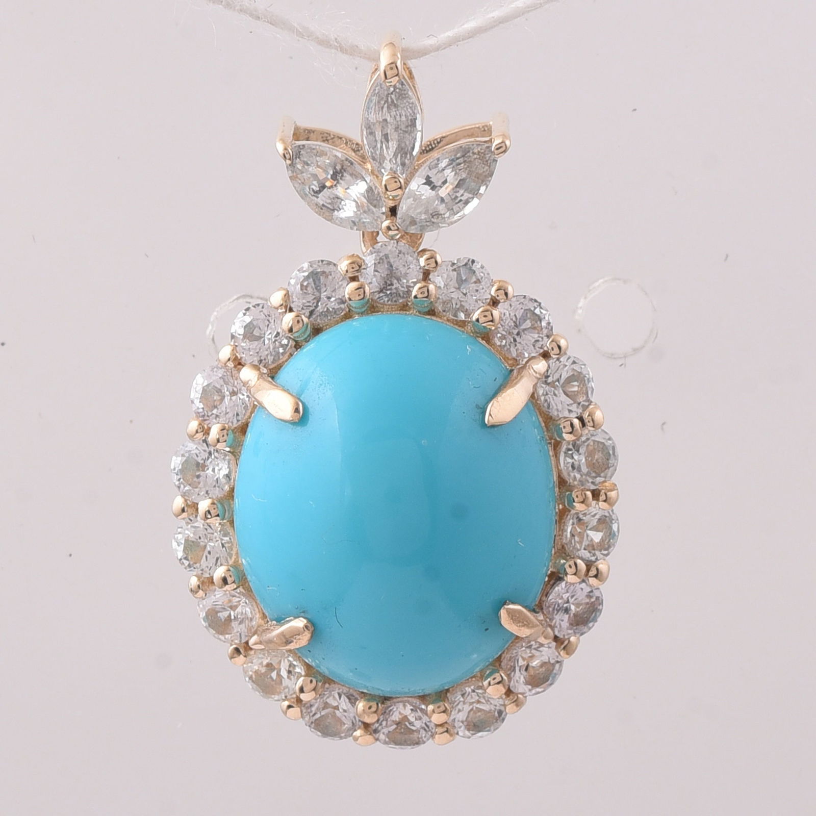 4.60 Ct Oval Turquoise 9K Gold Pendant: Title: 4.60 Ct Oval Turquoise 9K Gold Pendant Description: 4.60 Total Carat Turquoise 9K Gold Pendant Specifications - Total Weight 2.335 g - Center Gemstone Turquoise - Gemstone Carat Weight 3.5