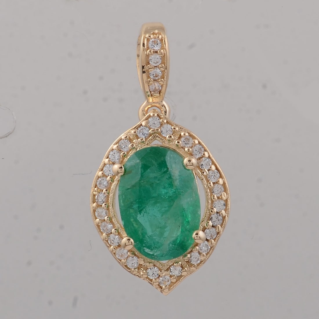 1.25 Ct Oval Emerald 9K Gold Pendant: Title: 1.25 Ct Oval Emerald 9K Gold Pendant Description: 1.25 Total Carat Emerald 9K Gold Pendant Specifications - Total Weight 1.14 g - Center Gemstone Emerald - Gemstone Carat Weight 1.13 Carats -