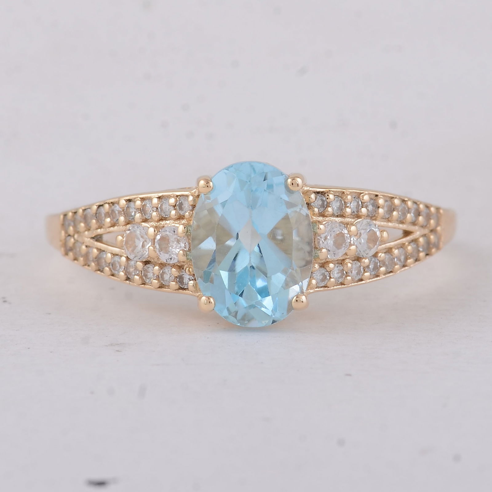 1.75 Ct Oval Blue Topaz 9K Gold Ring: Title: 1.75 Ct Oval Blue Topaz 9K Gold Ring Description: 1.75 Total Carat Blue Topaz 9K Gold Ring Specifications - Total Weight 2.13 g - Center Gemstone Blue Topaz - Gemstone Carat Weight 1.47 Carats