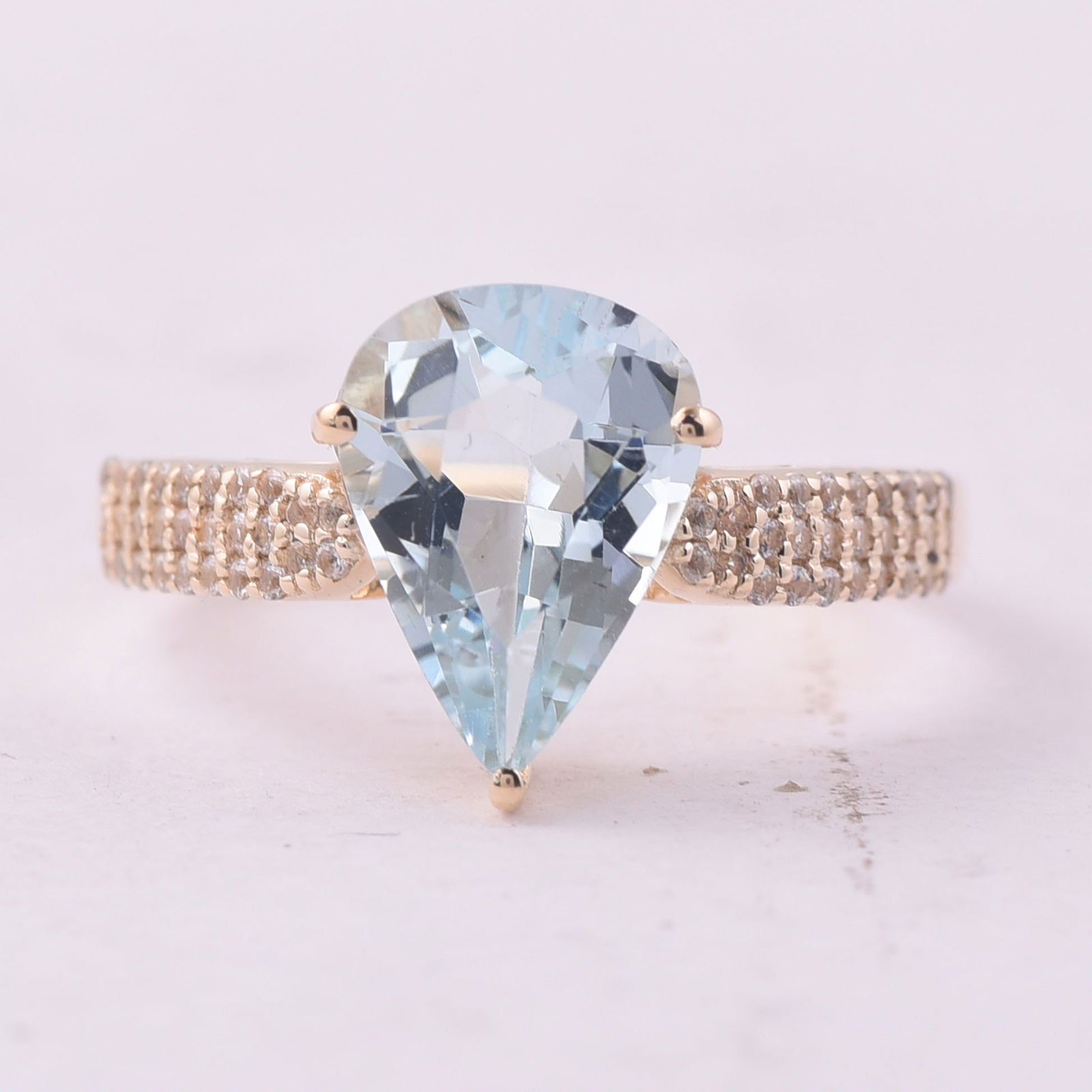 2.24 Ct Pear Aquamarine 9K Gold Ring: Title: 2.24 Ct Pear Aquamarine 9K Gold Ring Description: 2.24 Total Carat Aquamarine 9K Gold Ring Specifications - Total Weight 2.28 g - Center Gemstone Aquamarine - Gemstone Carat Weight 1.99 Carats