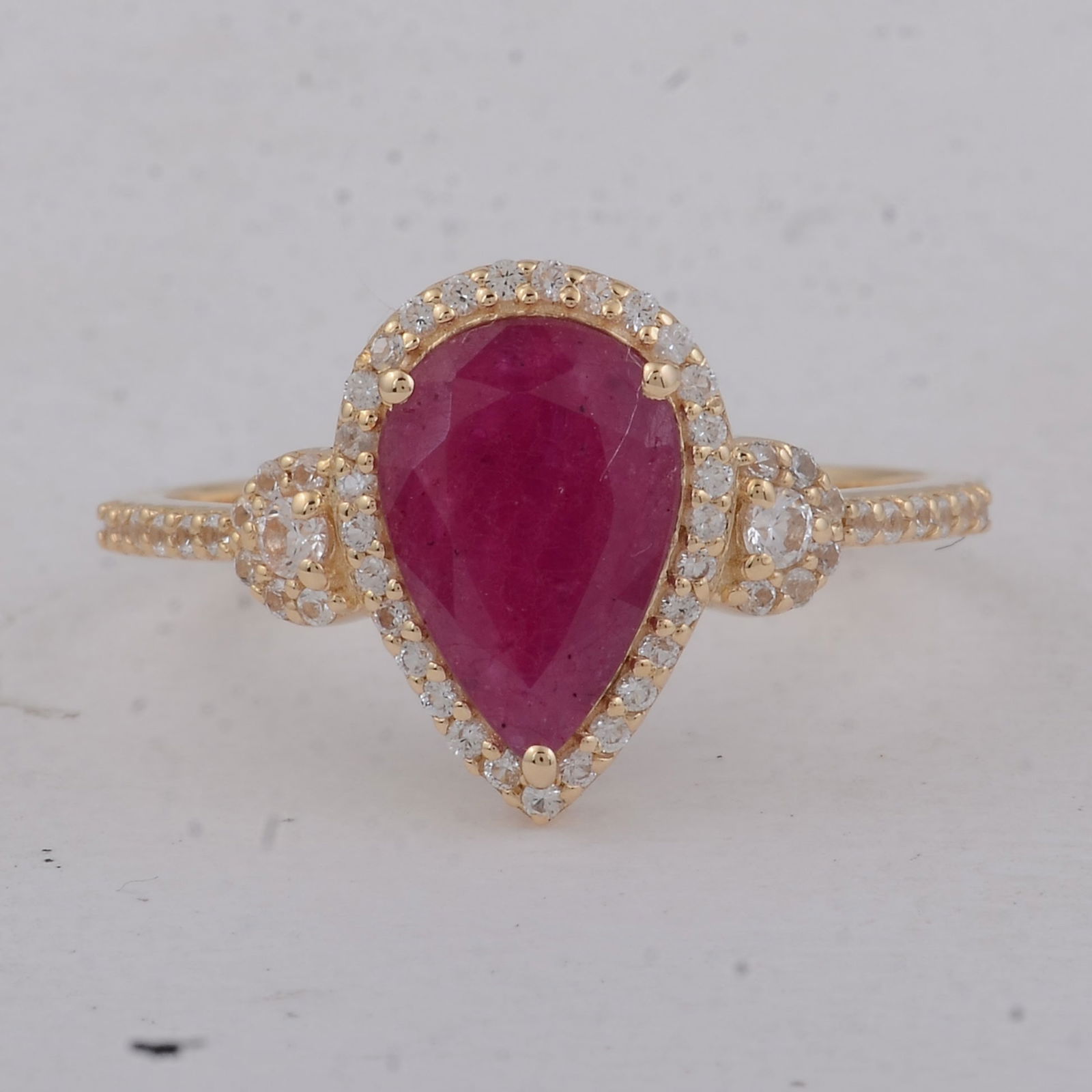 1.49 Ct Pear Ruby 9K Gold Ring: Title: 1.49 Ct Pear Ruby 9K Gold Ring Description: 1.49 Total Carat Ruby 9K Gold Ring Specifications - Total Weight 1.82 g - Center Gemstone Ruby - Gemstone Carat Weight 1.23 Carats - Gemstone Measure