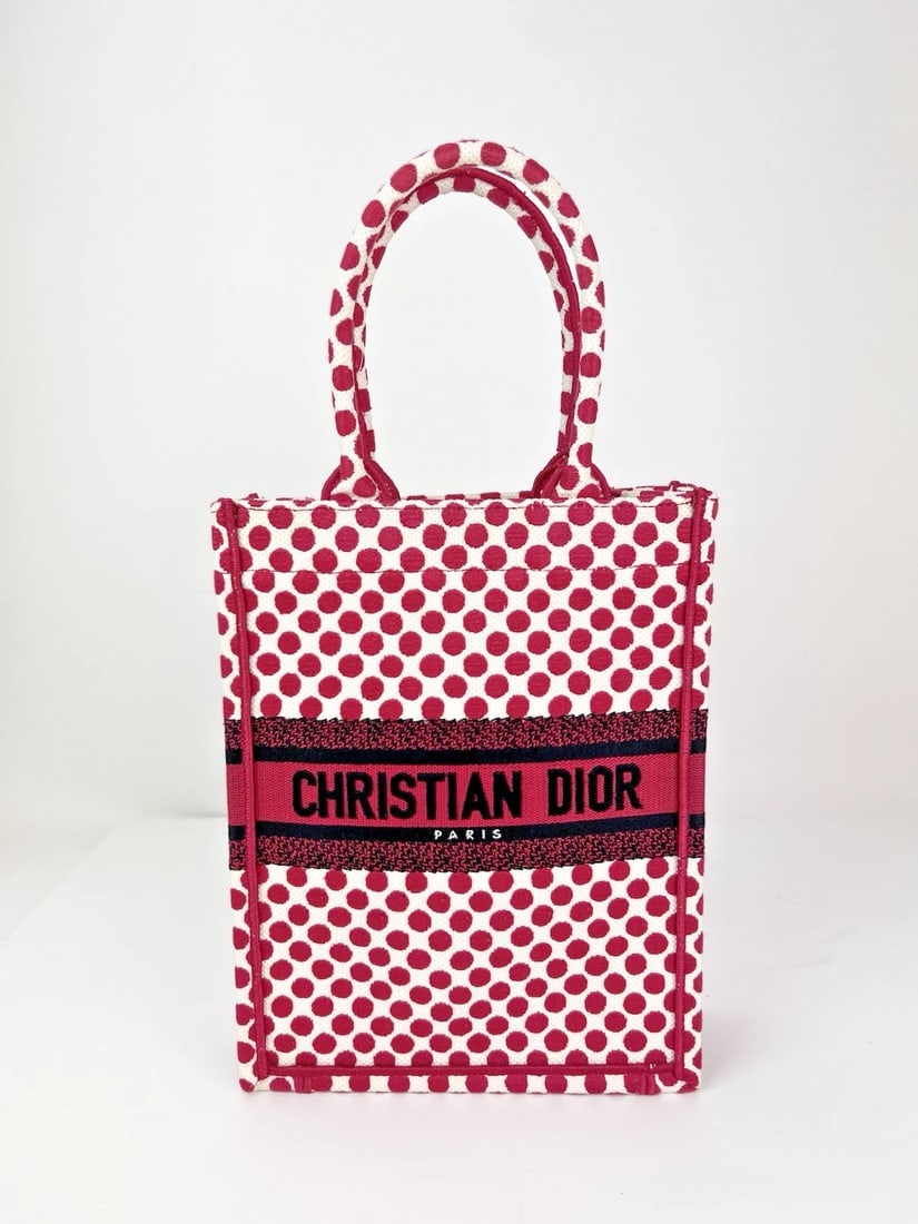 Christian Dior Canvas Dior Amour Dots Vertical Book Tote: Title: Christian Dior Canvas Dior Amour Dots Vertical Book Tote Description: Pre-Owned 100% Authentic Christian Dior Canvas Amour Dots Red Vertical Book Tote RATING: A/B...Very Good, well maintained,