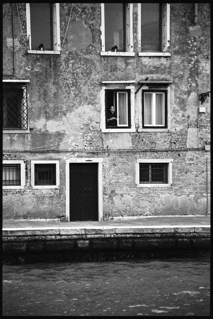 Man at Window, Venice, Italy - Silver Gelatin: Title: Man at Window, Venice, Italy - Silver Gelatin Description: Title: Man at Window, Venice, Italy - Silver Gelatin Photograph - Limited Edition of 10Artist: Paul CooklinOrigin: United