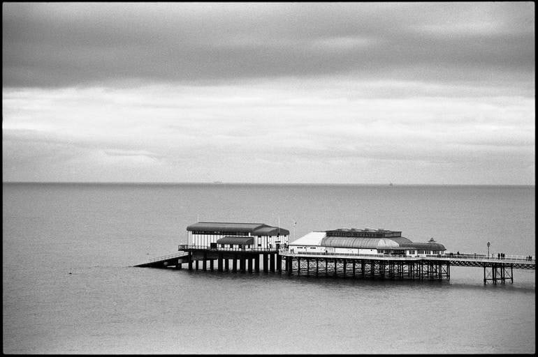 Cromer Pier, North Norfolk - Silver Gelatin: Title: Cromer Pier, North Norfolk - Silver Gelatin Description: Title: Cromer Pier, North Norfolk - Silver Gelatin Photograph - Limited Edition of 10Artist: Paul CooklinOrigin: United KingdomMedium: