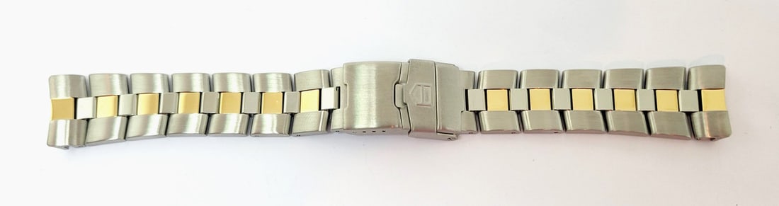 S/Steel & 18k TAG HEUER Watch Bracelet FAD001 for ZA7315 Model* 20 mm EXLNT: Mens S/Steel & 18k TAG HEUER Watch Bracelet FAD001 for ZA7315 Model* 20 mm EXLNT ​ This Men’s Tag Heuer watch is Swiss made. Great present for someone you love or yourself! * Stainless ste