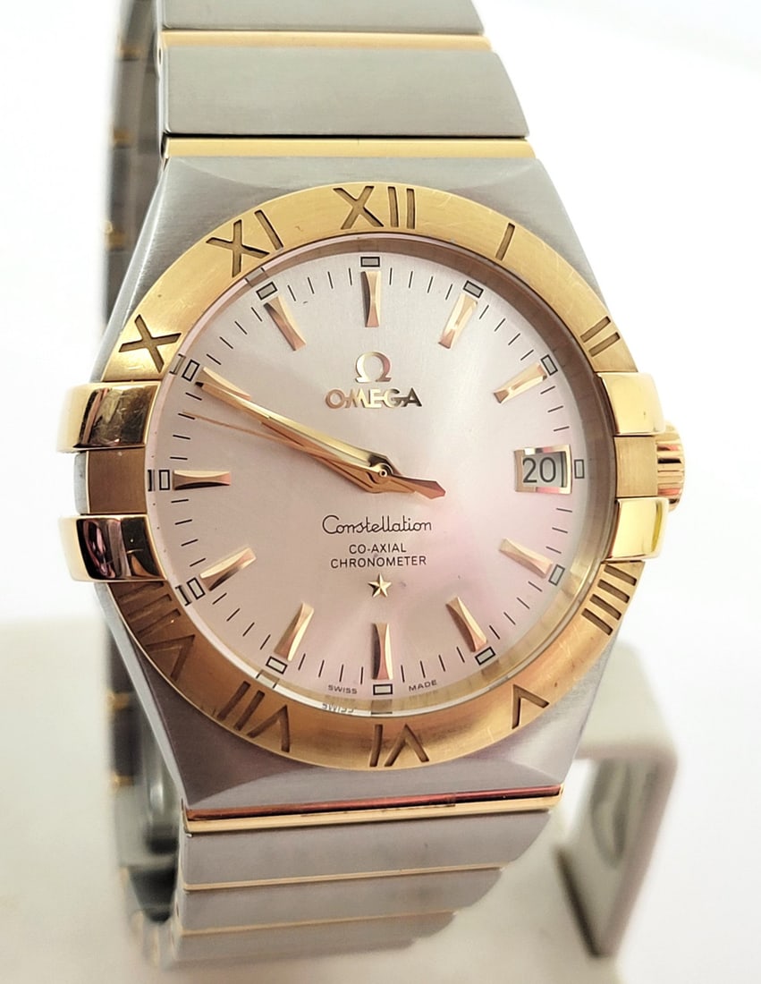Men's S/Steel/18k OMEGA CONSTELLATION CO-AXIL Automatic Watch 123.20.35.20.02.001: Men's S/Steel & 18k OMEGA CONSTELLATION Co-Axial CHRONOMETER Automatic Watch* MINT 123.20.35.20.02.001 This Men's Omega watch is Swiss made.. Great present for yourself or someone you love as well as