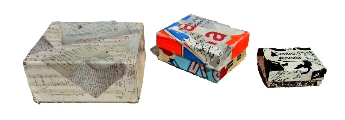 William Emboden Three collaged nesting boxes: Title:William Emboden Three collaged nesting boxesDescription:William Emboden (1935-2017). Three Collaged Nesting Boxes, largest box with the music on it is 4-1/2" x 4" x 2", the second largest with