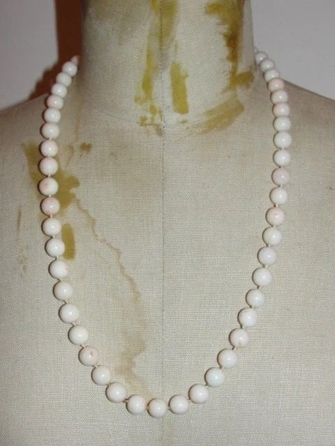 Gorgeous Angel Skin Coral Bead Necklace: Title:Gorgeous Angel Skin Coral Bead NecklaceDescription:Classic and timeless. Angel skin coral bead necklace. Circa 1940's. Beads measure 10 mm's in diameter. Necklace measures 27" long. 