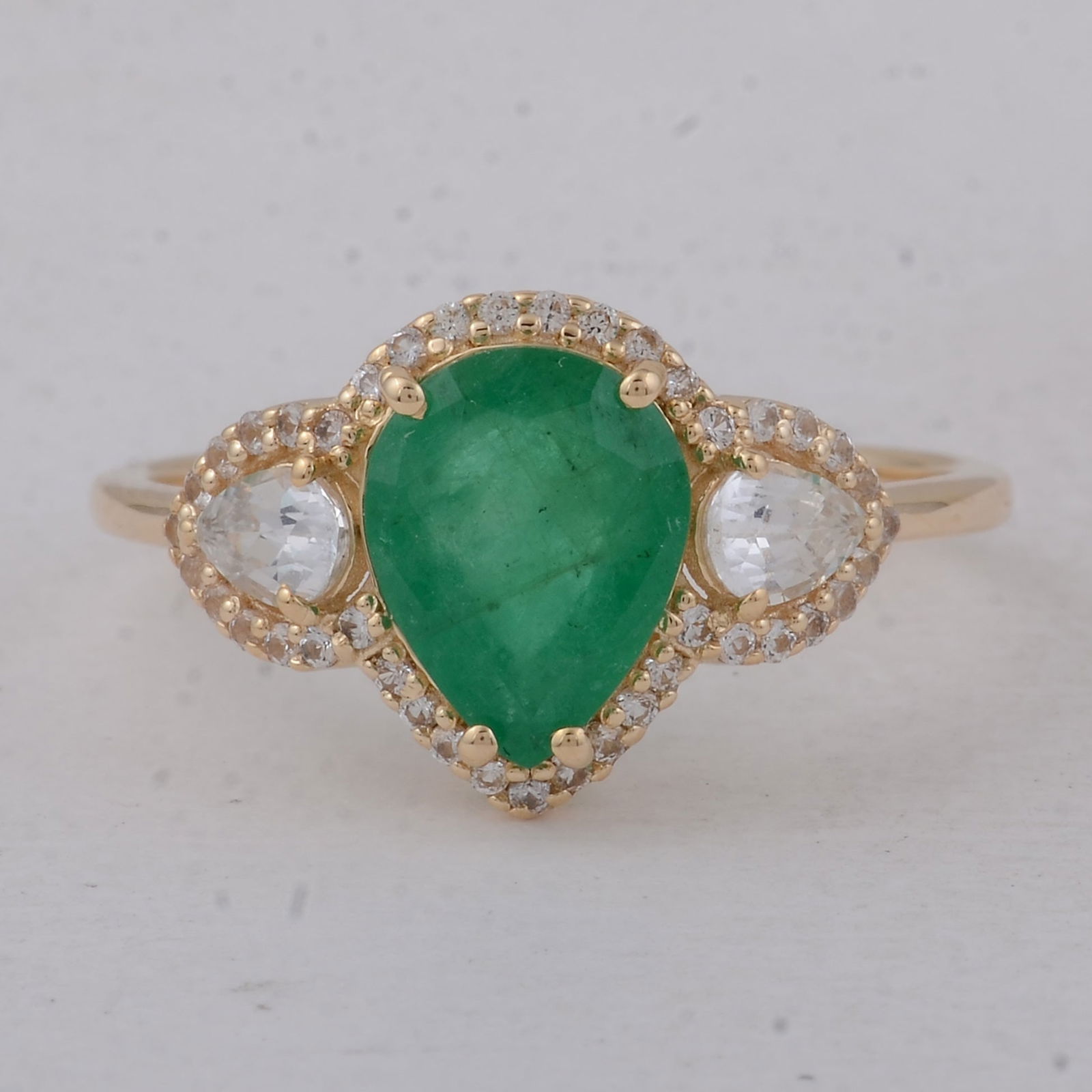 1.98 Ct Pear Emerald 9K Gold Ring: Title:1.98 Ct Pear Emerald 9K Gold Ring Description:1.98 Total Carat Emerald 9K Gold Ring Specifications - Total Weight 1.96 g - Center Gemstone Emerald - Gemstone Carat Weight 1.41 Carats - Gemstone