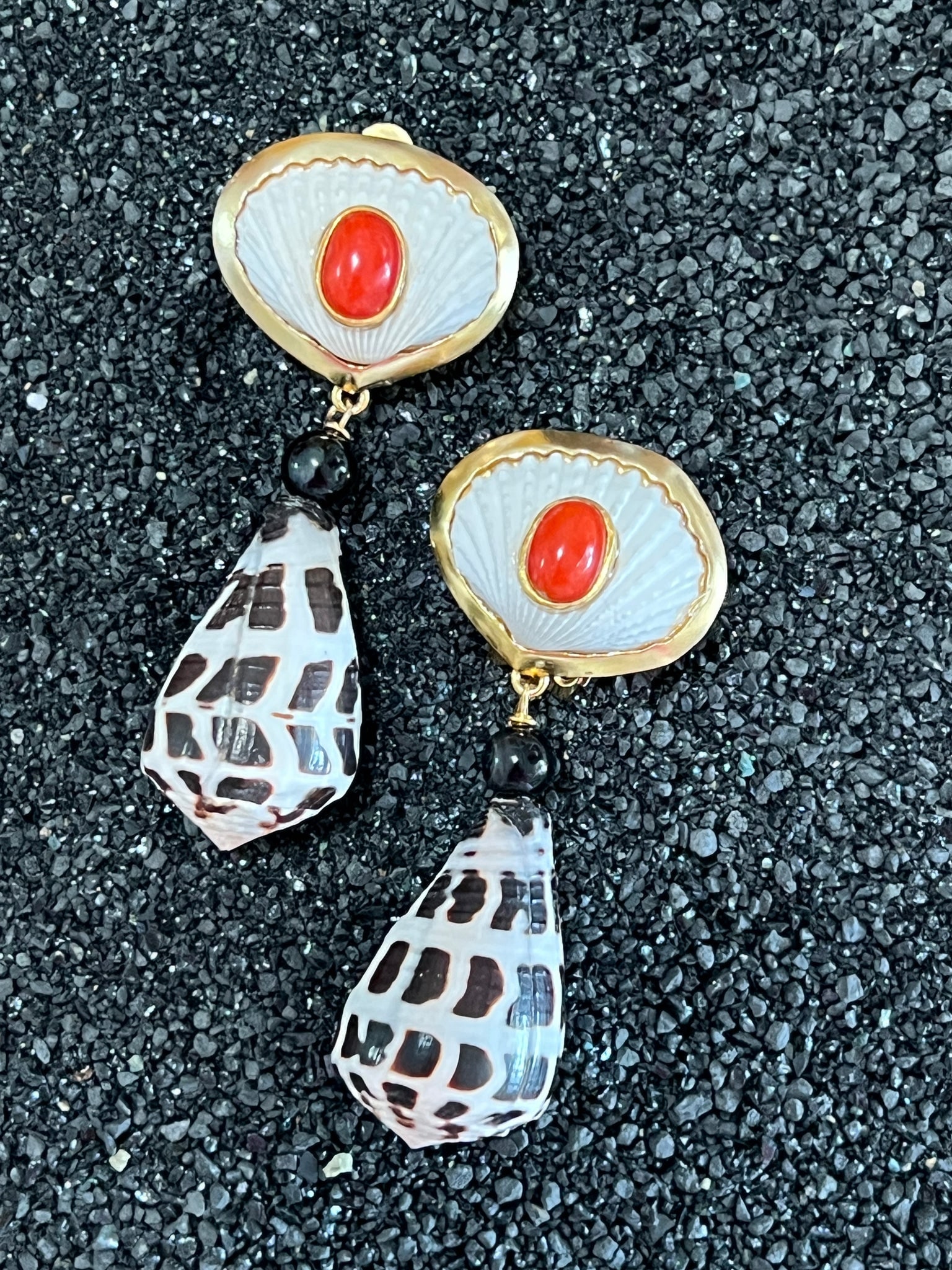 Scallop , Conus and Italian Coral Earrings: Title:Scallop , Conus and Italian Coral EarringsDescription:Kicky white Scallops set with Italian Coral Cabochons. Drops of Onyx and Conus Ebraeus- 1.75" drop - clip/post back - Vermeil Setting 
