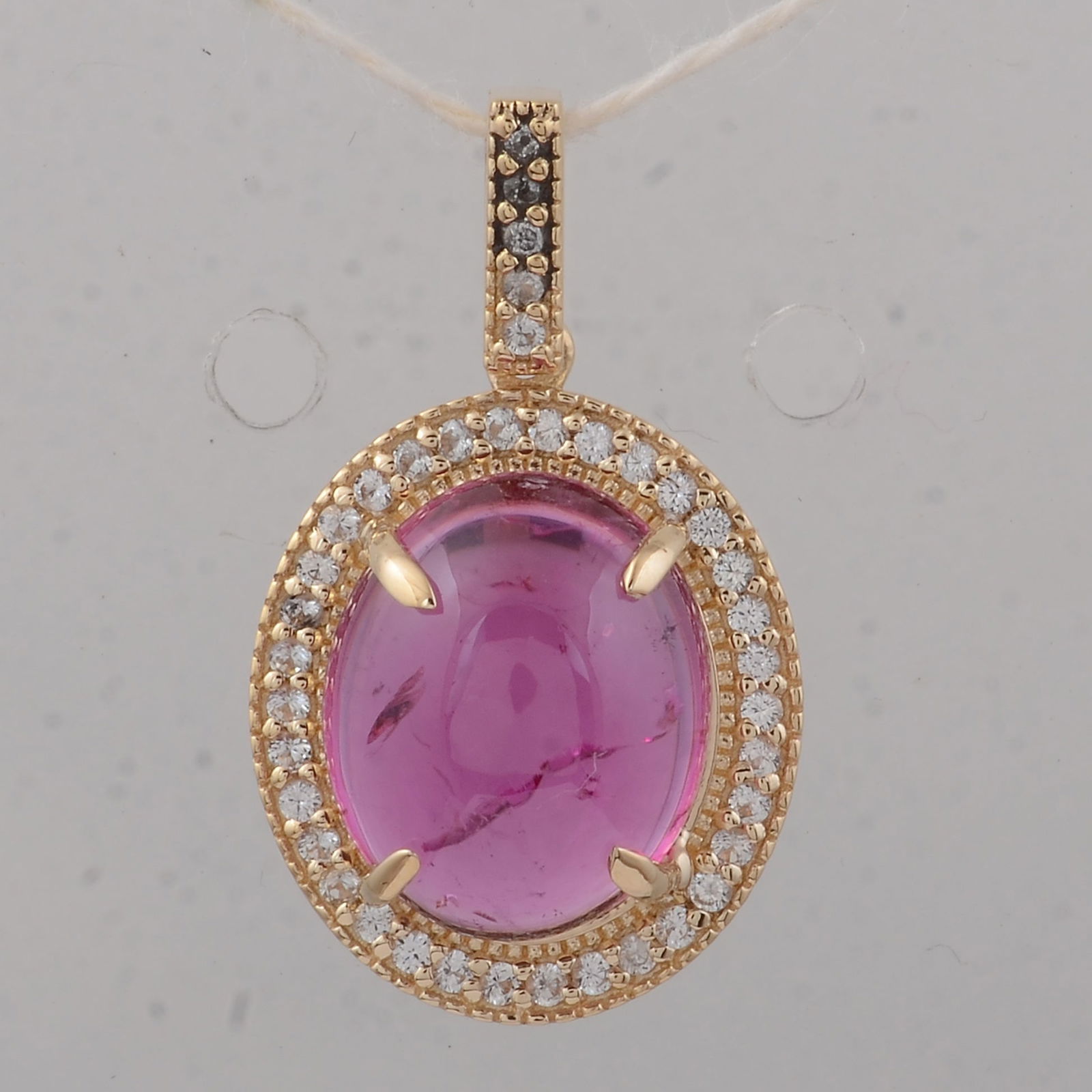 3.25 Ct Oval Tourmaline 9K Gold Pendant: Title:3.25 Ct Oval Tourmaline 9K Gold Pendant Description:3.25 Total Carat Tourmaline 9K Gold Pendant Specifications - Total Weight 1.69 g - Center Gemstone Tourmaline - Gemstone Carat Weight 3.1 Cara