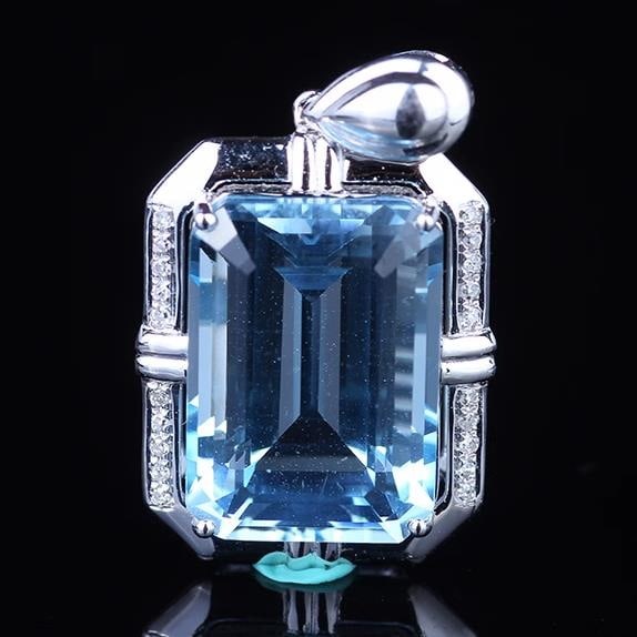 14K GOLD 12 CT NATURAL TOPAZ & DIAMOND PENDANT: Title:14K GOLD 12 CT NATURAL TOPAZ & DIAMOND PENDANTDescription:Ref:230528392Gold Content:14K GoldMain Gemstone:TopazNumber of stones:1Shape:OctagonalCarat Weight:12ct Color:BlueTreatment:NaturalCut