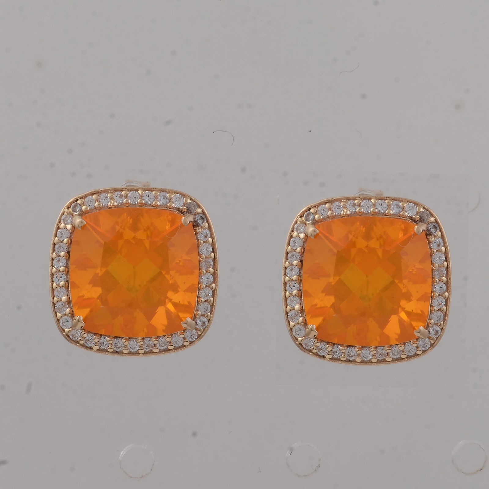 4.21 Ct Cushion B.R Fire Opal 9K Gold Earrings: Title:4.21 Ct Cushion B.R Fire Opal 9K Gold EarringsDescription:4.21 Total Carat B.R Fire Opal 9K Gold Earrings Specifications - Total Weight 2.812 g - Center Gemstone B.R Fire Opal - Gemstone Carat