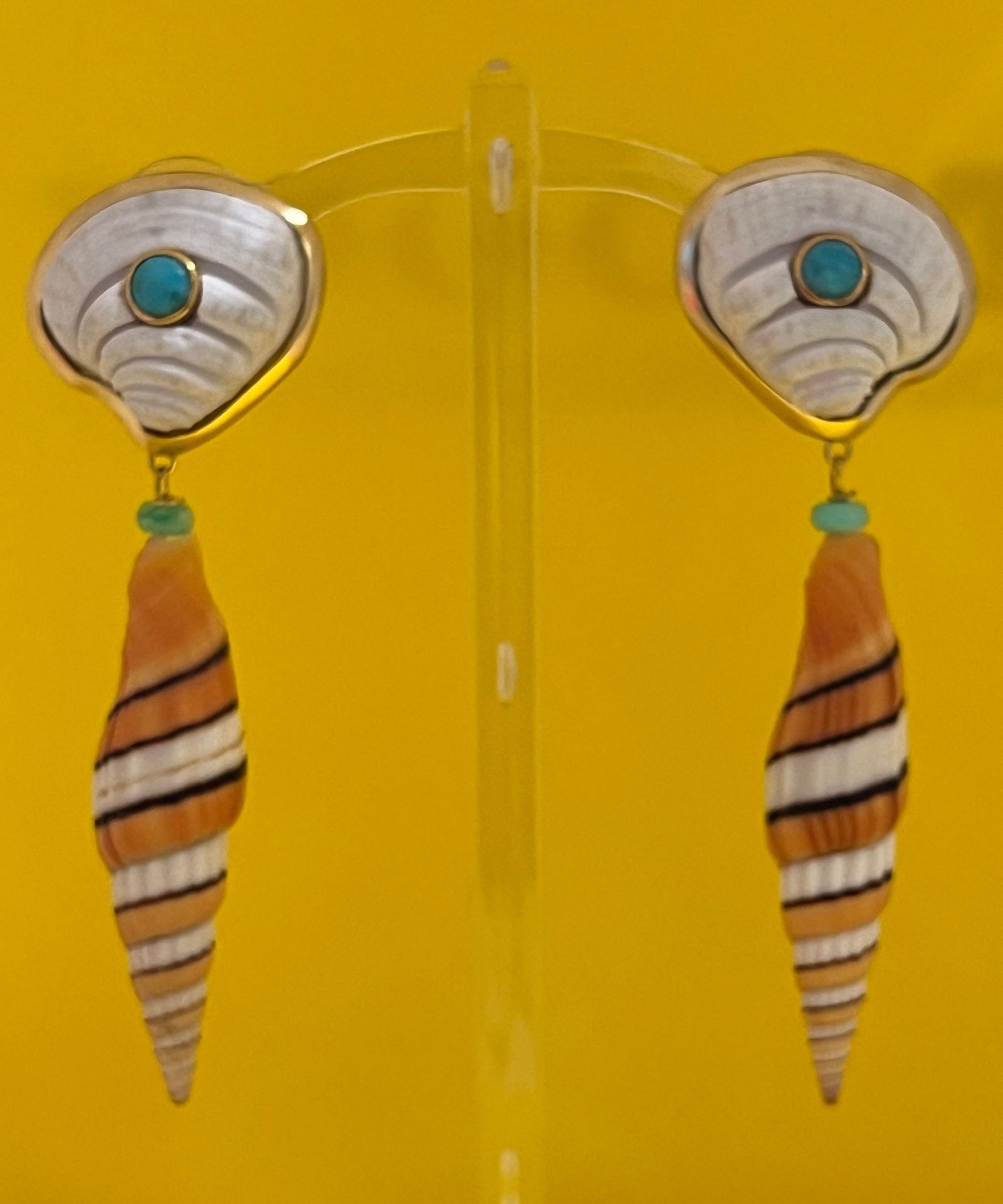 Rare Clam and Terebra Shell Drop Earrings: Title:Rare Clam and Terebra Shell Drop EarringsDescription:Kicky Turquoise, white and orange like a summer day in Maine. Rare clams, Turquoise, drops of Amazonite and exotic Terebra shells. Drop
