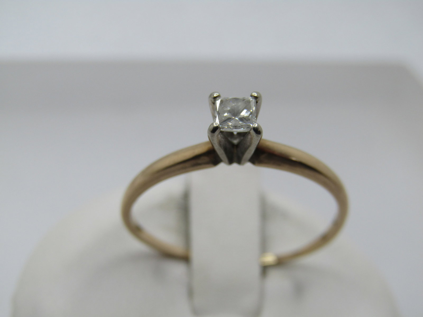 Vintage 10kt Square Diamond Engagement Ring, .18 CTW, Sz. 9.5, Signed: Title:Vintage 10kt Square Diamond Engagement Ring, .18 CTW, Sz. 9.5, SignedDescription:Vintage 10kt Square Diamond Engagement Ring, .18 CTW, Sz. 9.5, Signed H with a heart and Keepsake and marked