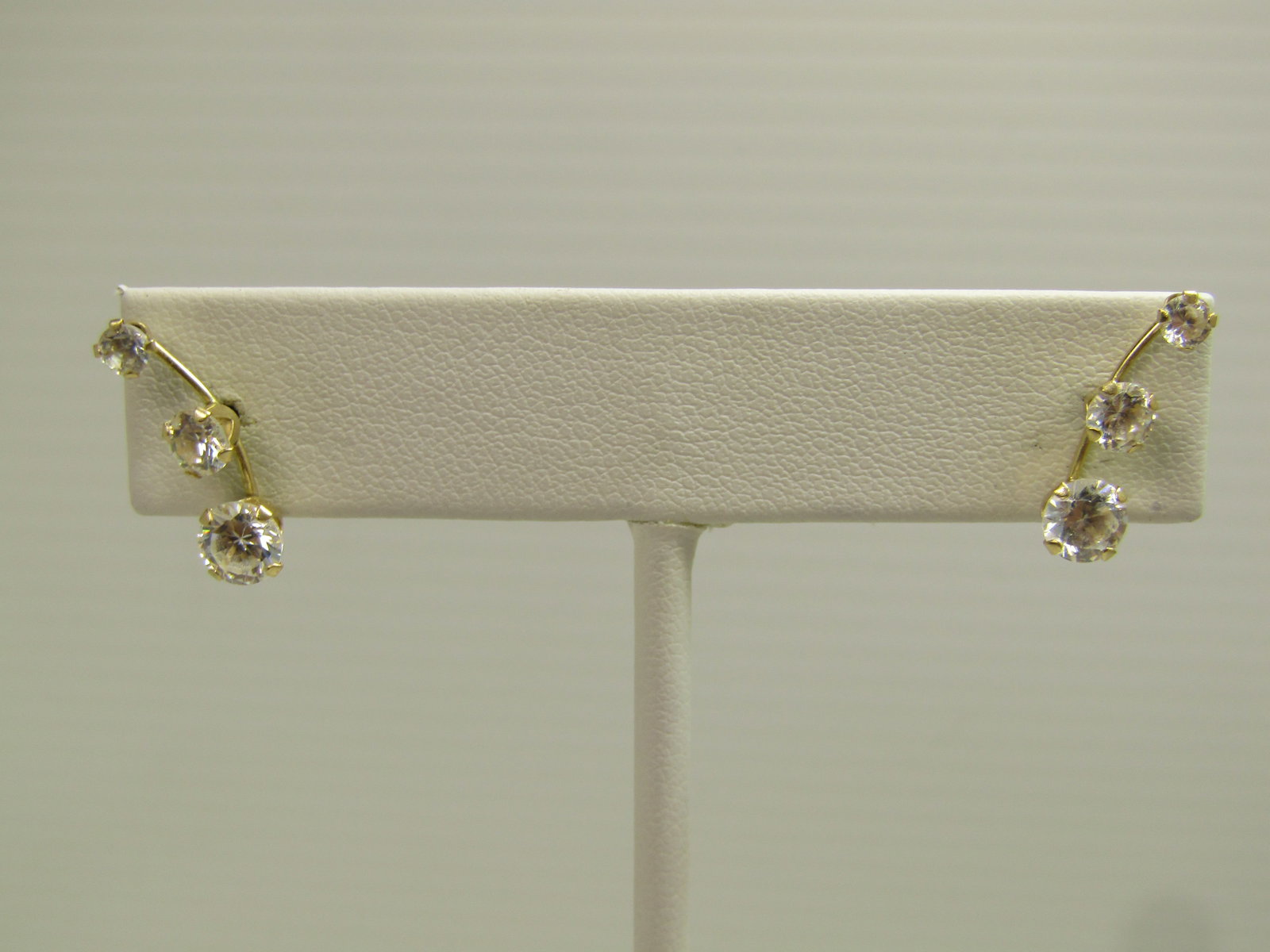 Vintage 14kt CZ Past/Present/Future Earrings, Pierced, 1980's-1990's: Title:Vintage 14kt CZ Past/Present/Future Earrings, Pierced, 1980's-1990'sDescription:Vintage 14kt CZ Past/Present/Future Earrings, Pierced, 1980's-1990's. Curved design and appx. 3/4" long. Three