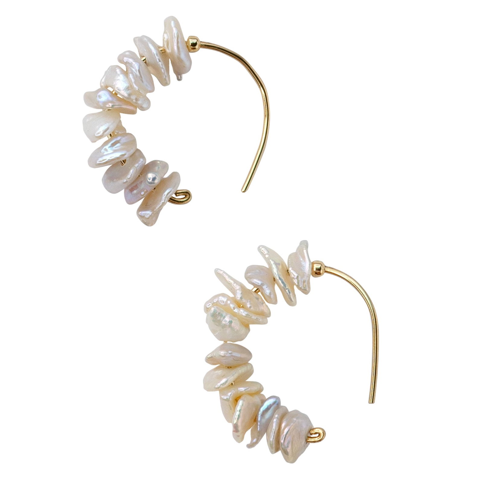 Petal Pearl Half Moon Earring 14K Gold Hook: Title:Petal Pearl Half Moon Earring 14K Gold Hook Description:Delicate flower petals caught in a morning breeze, these lustrous pearls dance along your ear with effortless grace. Each baroque pearl ca
