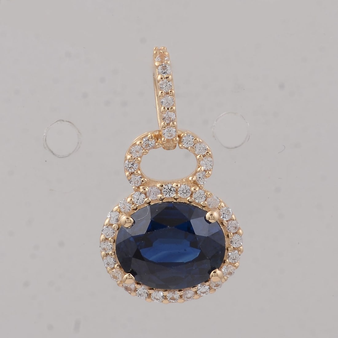1.65 Ct Oval Sapphire 9K Gold Pendant: Title:1.65 Ct Oval Sapphire 9K Gold Pendant Description:1.65 Total Carat Sapphire 9K Gold Pendant Specifications - Total Weight 1.02 g - Center Gemstone Sapphire - Gemstone Carat Weight 1.48 Carats -