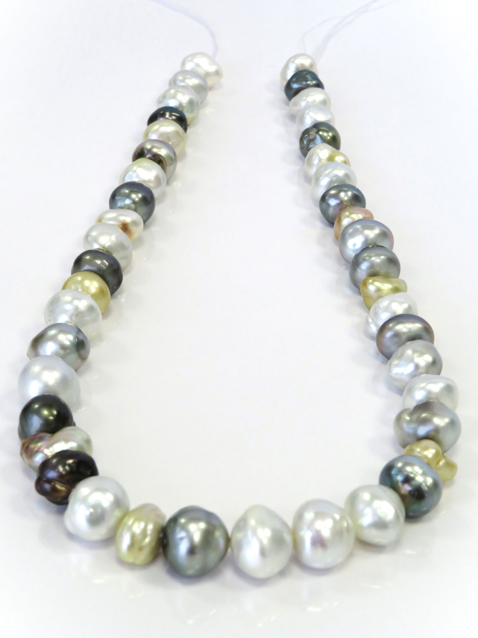 9-14mm Mix Button-Baroque Multi-Color Tahitian, White/Golden South Sea and Keshi Pearl Necklace: Title:9-14mm Mix Button-Baroque Multi-Color Tahitian, White/Golden South Sea and Keshi Pearl Necklace StrandDescription:A-Grade High luster Multi-Color Mix Button-Baroque, Center-Drilled, with