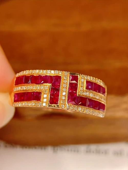 18k Natural Ruby Ring: Title: 18k Natural Ruby Ring Description: 18k Natural Ruby Ring Total weight: 2.01 grams Main stone: 2.2 carats Diamonds: 87 Reserve: $1,600.00 Shipping:Domestic: Shipping rates are determined by