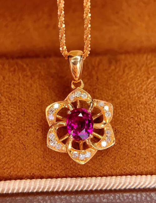 18k Natural Untreated Ruby Pendant: Title: 18k Natural Untreated Ruby Pendant Description: 18k Natural Untreated Ruby Pendant (without chain) Total weight: 1.12 grams Main stone: 0.7 carats Diamonds: 18 Reserve: $900.00 