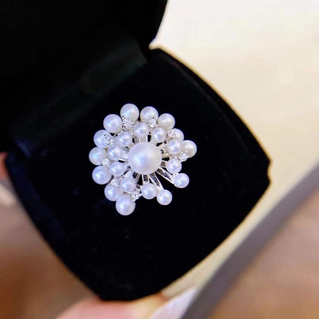 Sterling silver natural pearl ring: Title: Sterling silver natural pearl ring Description: This ring is meticulously crafted with S925 sterling silver, showcasing dazzling natural pearls that are perfectly round and flawless. The pearls