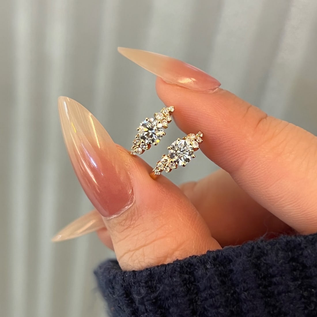 Cultivate diamond earrings: Title: Cultivate diamond earrings Description: This pair of earrings features dazzling cultivated diamonds, with each main diamond weighing 30 points and of DE-VVS quality, showcasing a brilliant