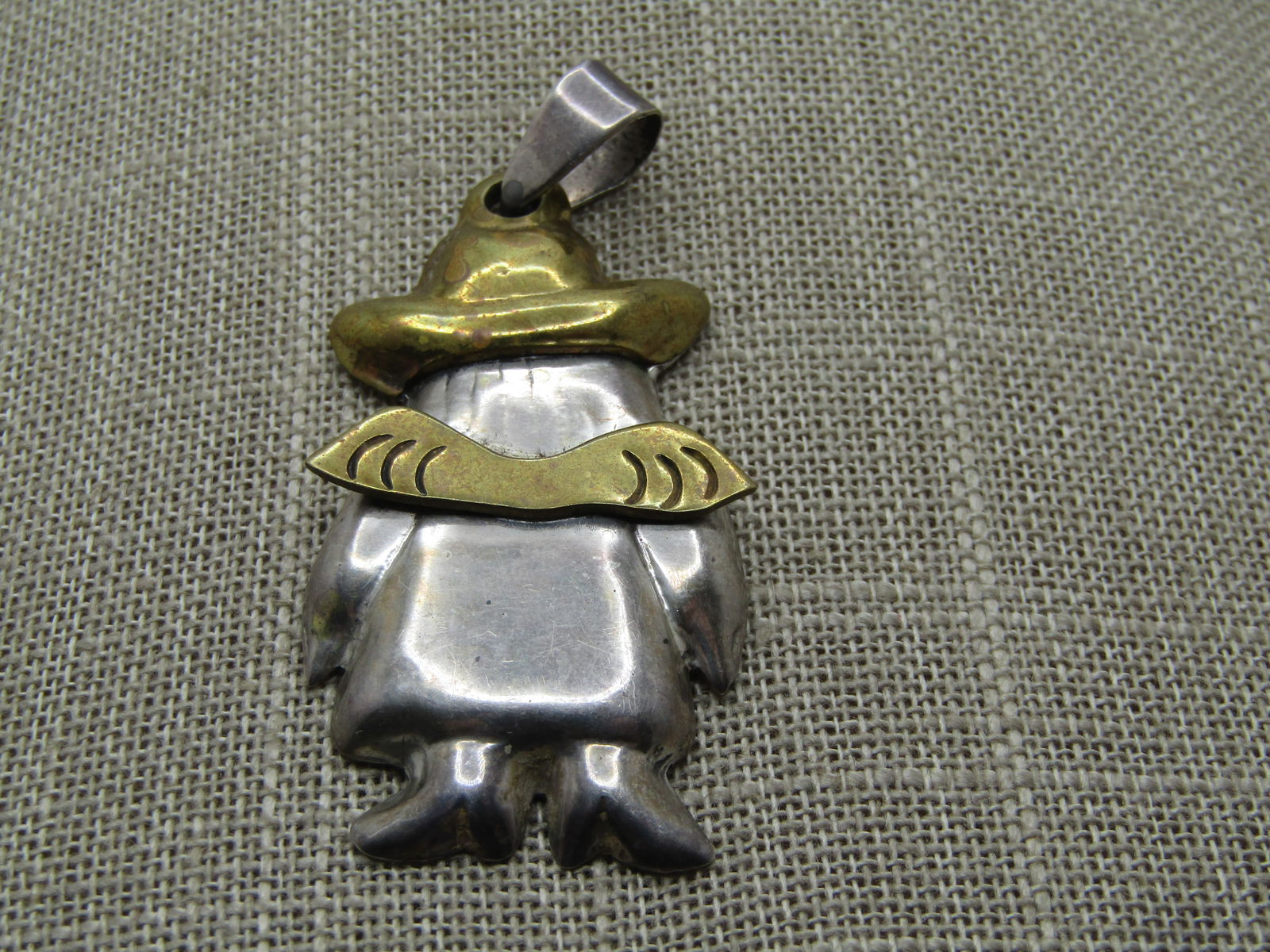 Vintage Sterling and Brass Women/Angel Pendant, Mexico Signed Amalia, 1970's-1980's: Title: Vintage Sterling and Brass Women/Angel Pendant, Mexico Signed Amalia, 1970's-1980's Description: Vintage Sterling and Brass Women/Angel Pendant, Mexico Signed Amalia, 1970's-1980's. This looks