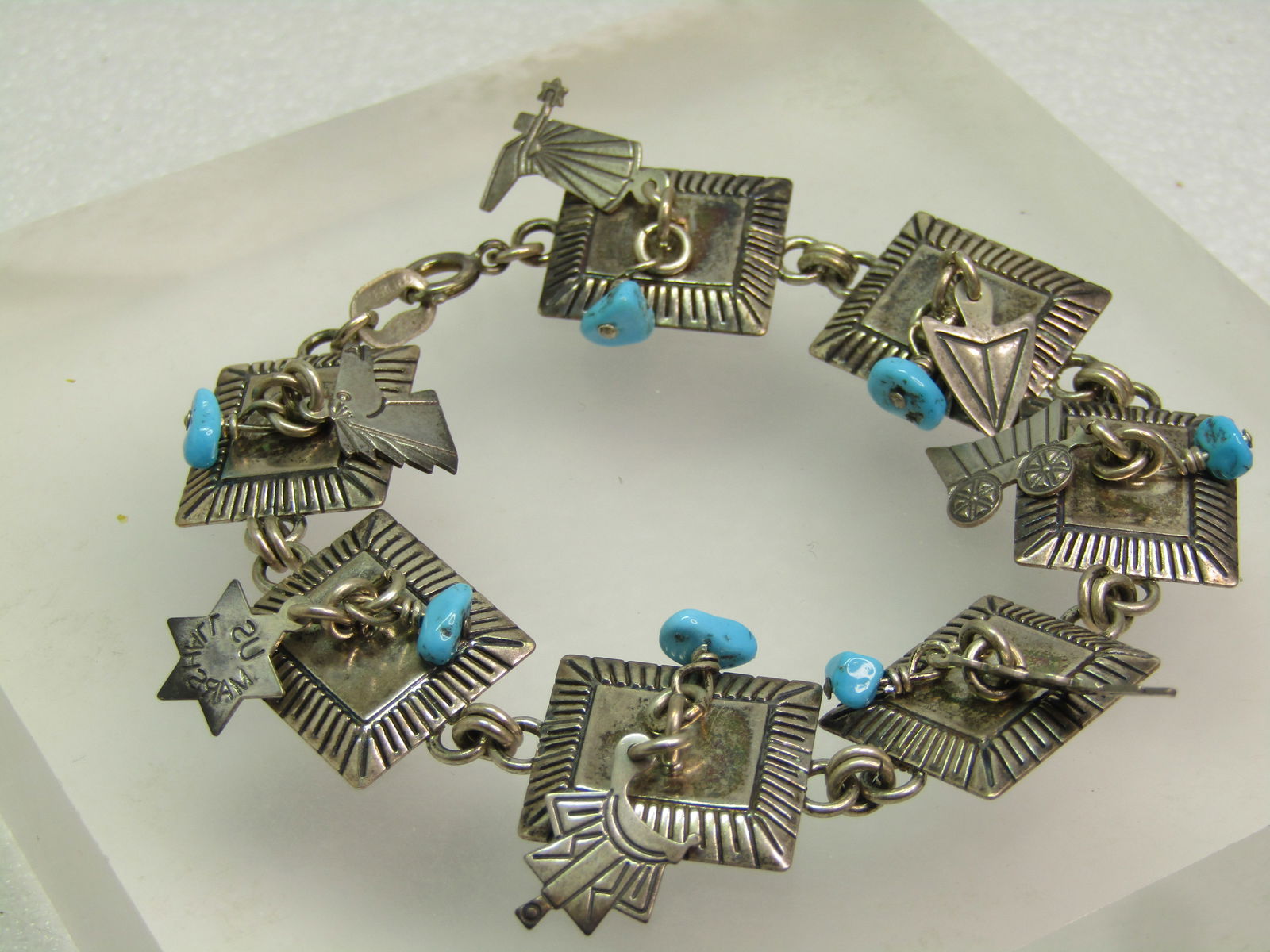 Vintage Sterling Turquoise & Charm Bracelet, Navajo, Richard Begay, 1970's. 7.75" - 2