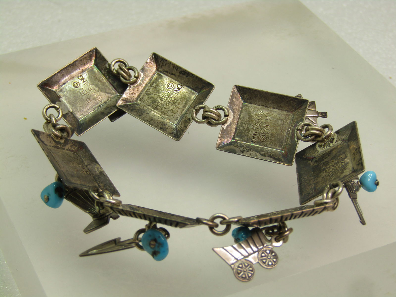 Vintage Sterling Turquoise & Charm Bracelet, Navajo, Richard Begay, 1970's. 7.75" - 5