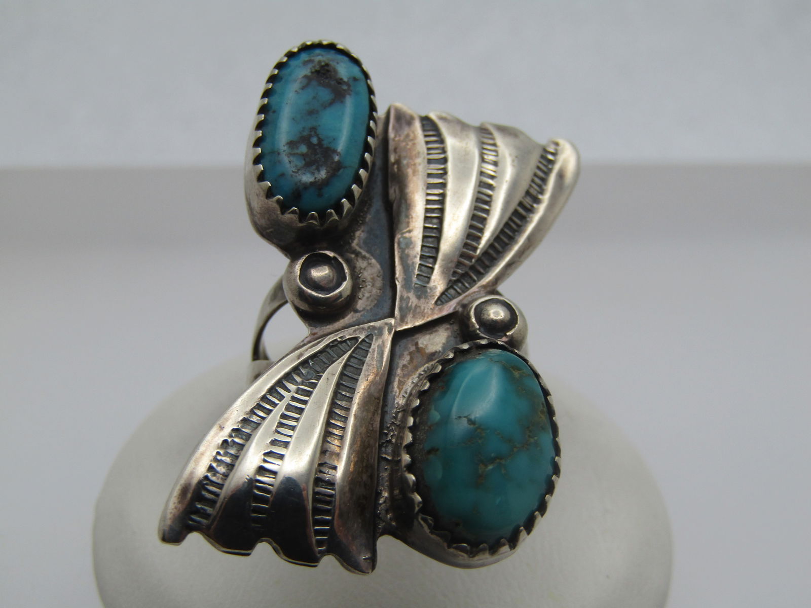 Vintage Sterling Southwestern Turquoise Ring, Sz. 6, 1970's-1980's: Title: Vintage Sterling Southwestern Turquoise Ring, Sz. 6, 1970's-1980's Description: Vintage Sterling Southwestern Turquoise Ring, Sz. 6, 1970's-1980's. This has two bezel-set oval stones, one sligh