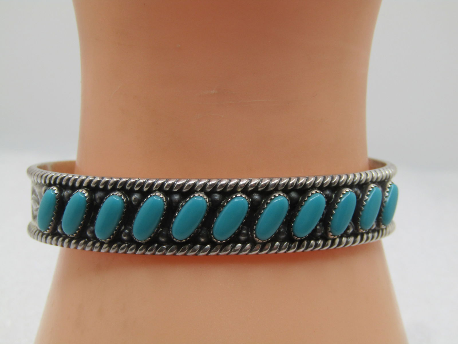 Vintage Sterling Southwestern Turquoise Cuff Bracelet, 6.75", 1980's-1990's: Title: Vintage Sterling Southwestern Turquoise Cuff Bracelet, 6.75", 1980's-1990's Description: Vintage Sterling Southwestern Turquoise Cuff Bracelet, 6.75", 1980's-1990's. 11mm wide with eleven 